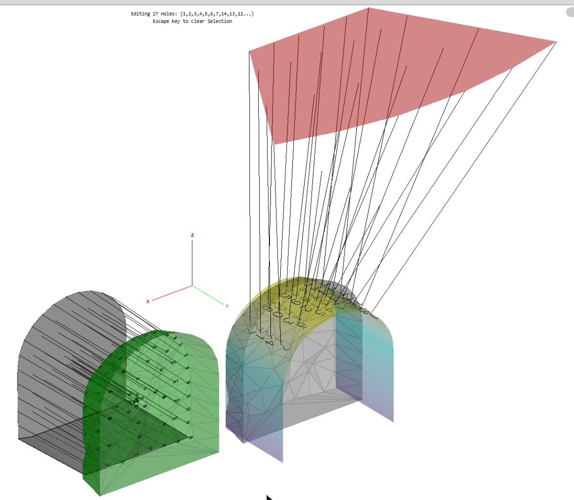 A development round drilled into a drive face, and an uphole ring fanning up from the drive back to a target surface
